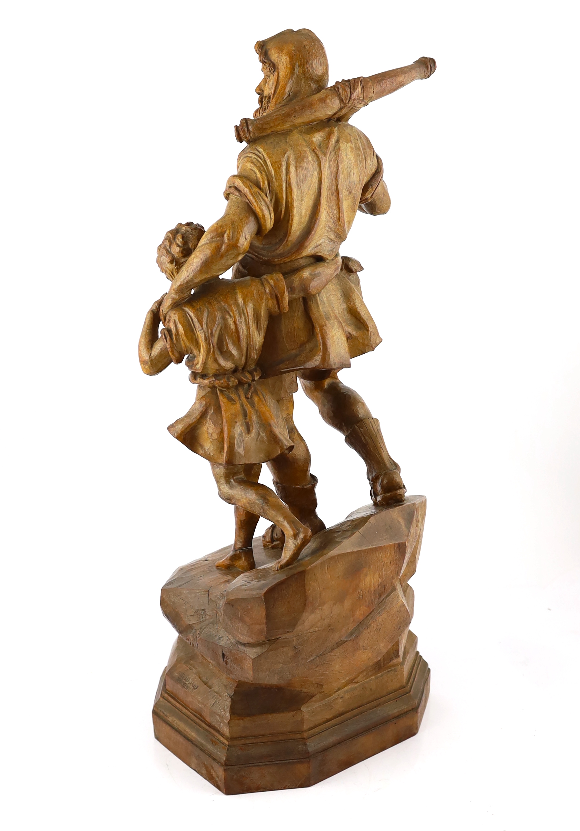 Jacob Abplanalp of Grindelwald, a carved group of William Tell and his son, 30cm high, 26cm deep, 71cm high